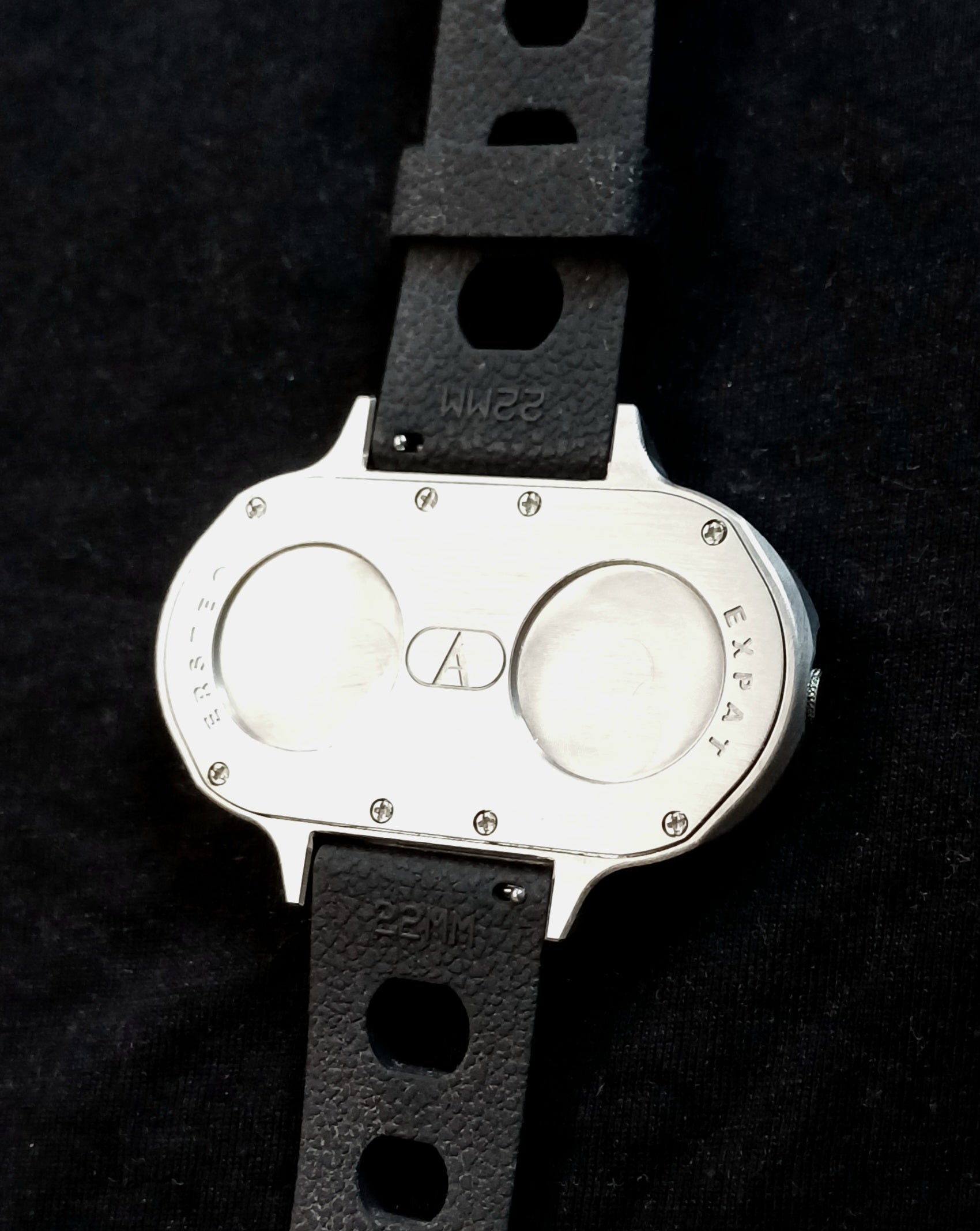 Dual time zone watch back 